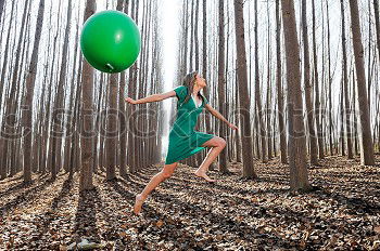 Similar – Beautiful blonde girl, dressed in green, standing in the forest