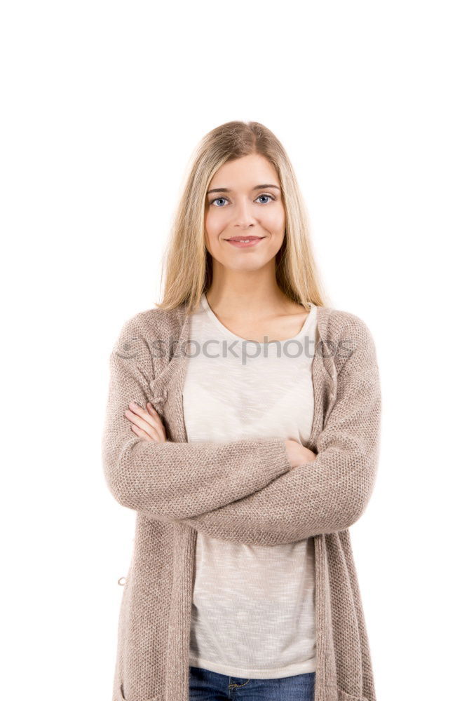 Similar – Young blonde woman smiling near a brick wall