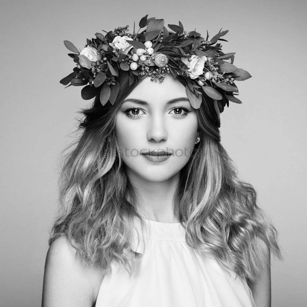 Similar – blonde young woman with flowers in background