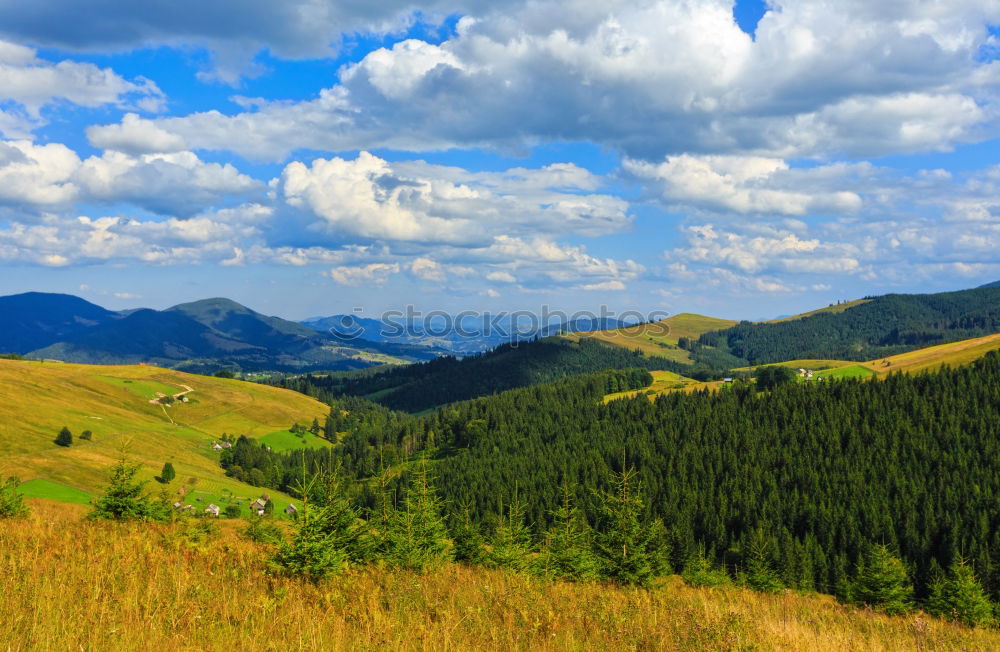 Similar – Green sunny valley in mountains and hills