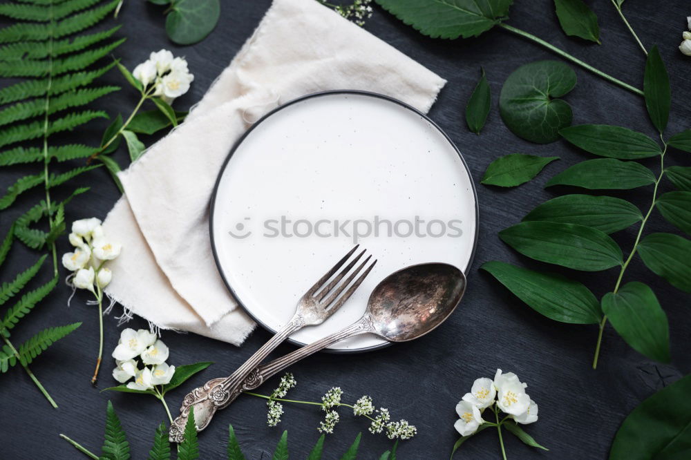 Similar – square white plate and iron cutlery