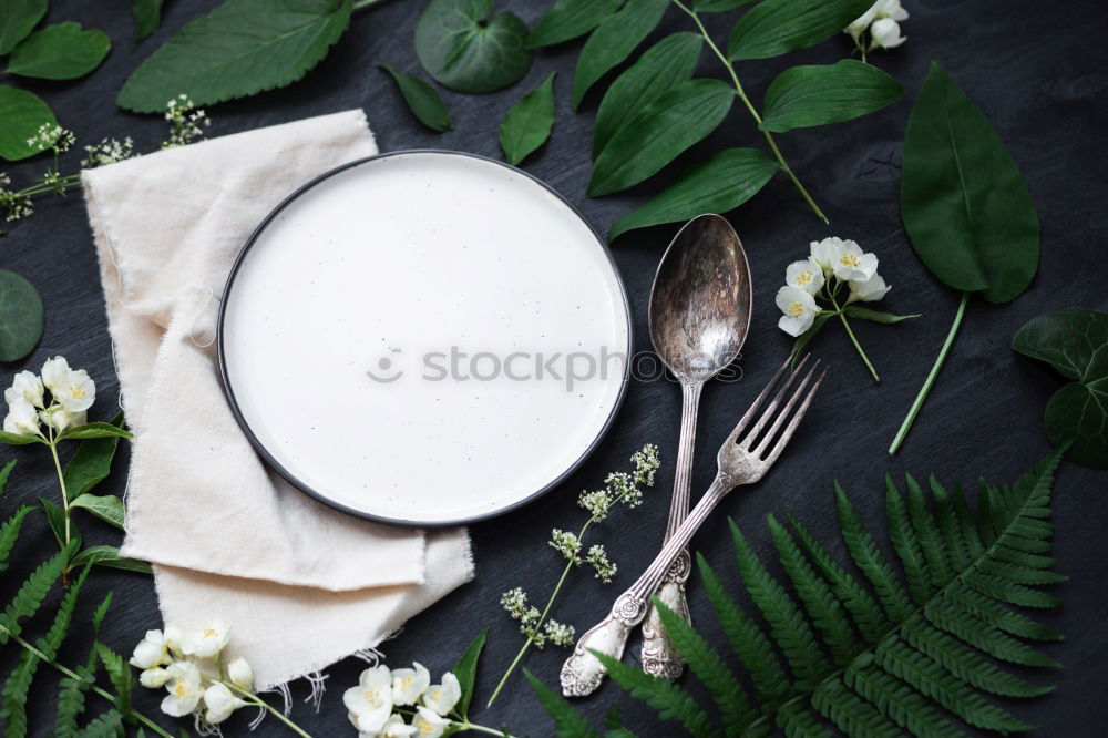 Similar – square white plate and iron cutlery