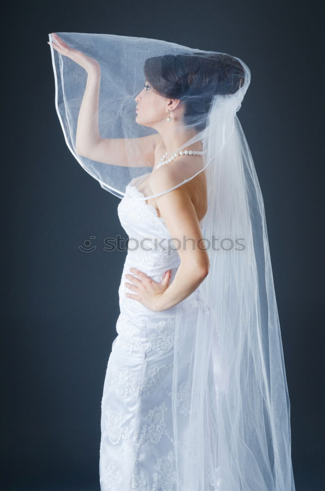 Similar – Woman with veil Feminine