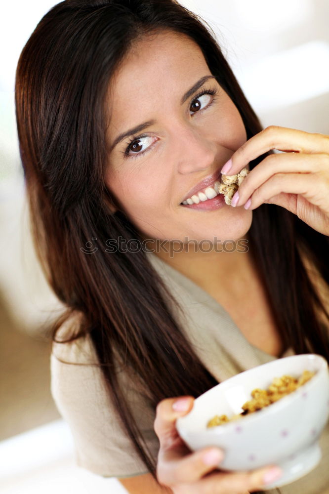 Similar – Crop woman eating sushi