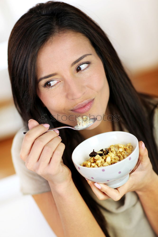 Similar – Image, Stock Photo woman close up eating oat and fruits bowl for breakfast