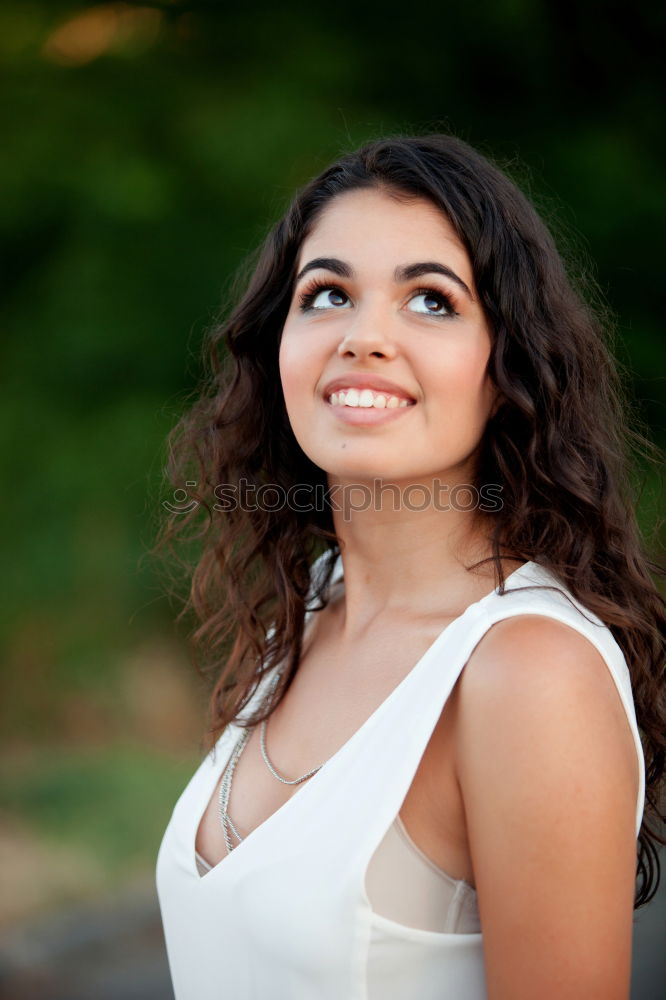 Similar – Happy young arabic woman with black curly hairstyle