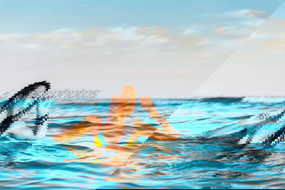 Image, Stock Photo Little kid playing and swimming on the sea
