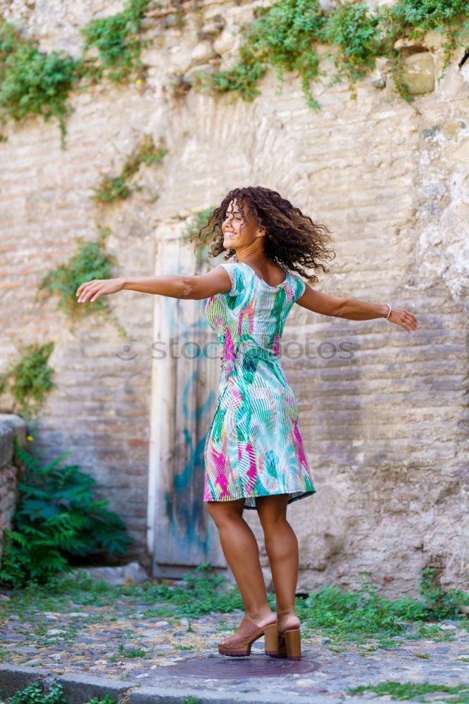 Similar – Image, Stock Photo Happy young blond woman standing on beautiful steps in the street.