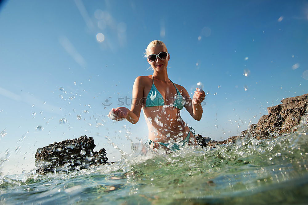 Similar – Image, Stock Photo Man in wetsuit swimming in ocean