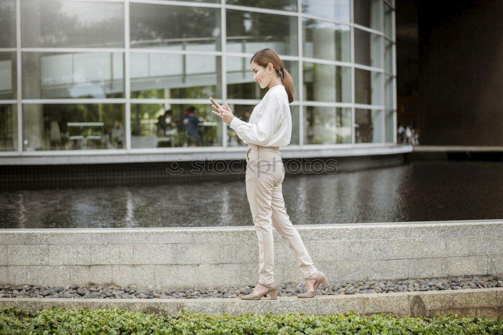 Similar – Image, Stock Photo Pretty yong girl standing behind shop center