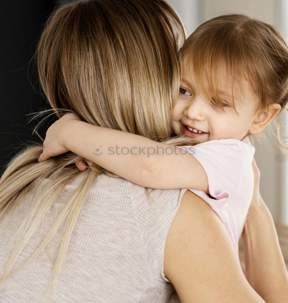 Similar – Image, Stock Photo Beautiful mother and daughter touching each other with their noses. Lovely family portrait