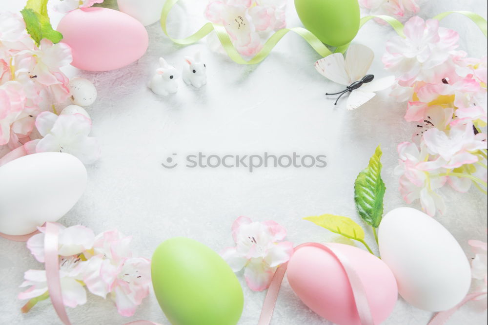 Similar – Image, Stock Photo Hanging Easter eggs with pink flowers