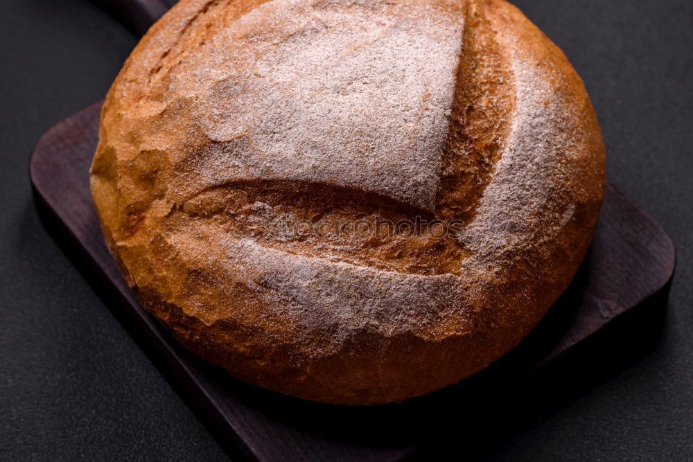 Similar – whole baked round bread