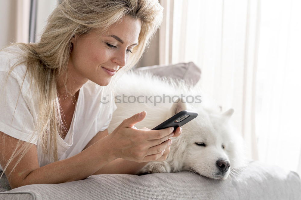 Similar – Image, Stock Photo Puppy sleeping on owner laps