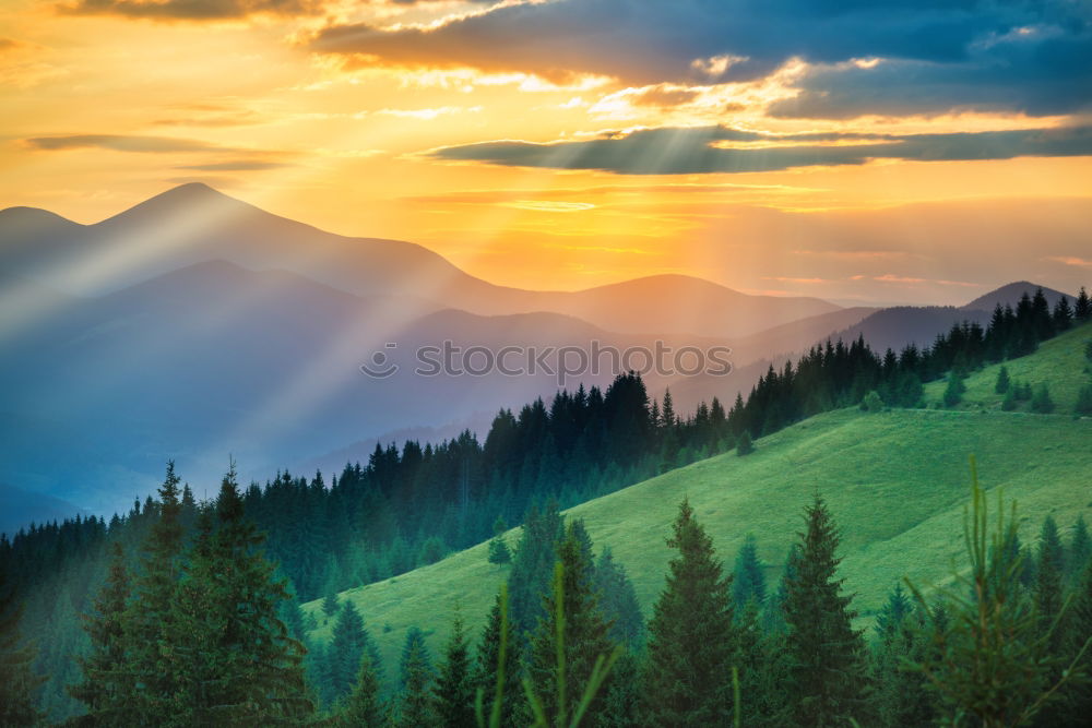 Similar – Panorama of sunset in the mountains