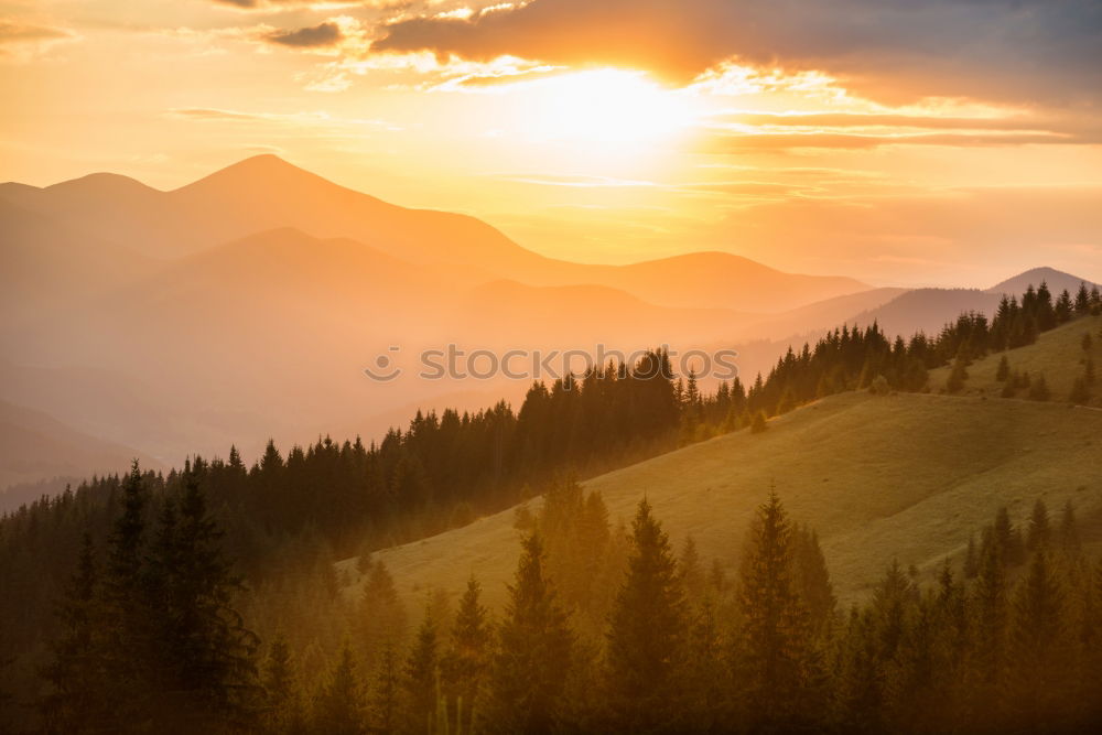 Similar – Panorama of sunset in the mountains