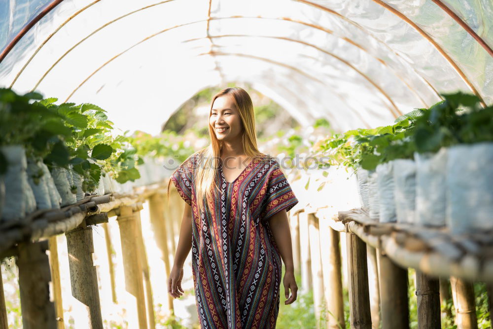 Similar – Image, Stock Photo Young woman walking in a path in the middle of a vineyard