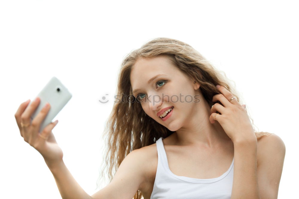 Similar – Young blonde girl with her mobile phone