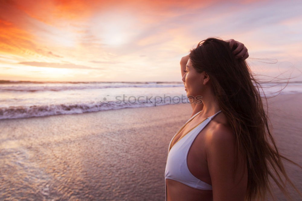 Similar – Image, Stock Photo Beautiful young woman wearing a bikini running in a wooden foot bridge at the beach