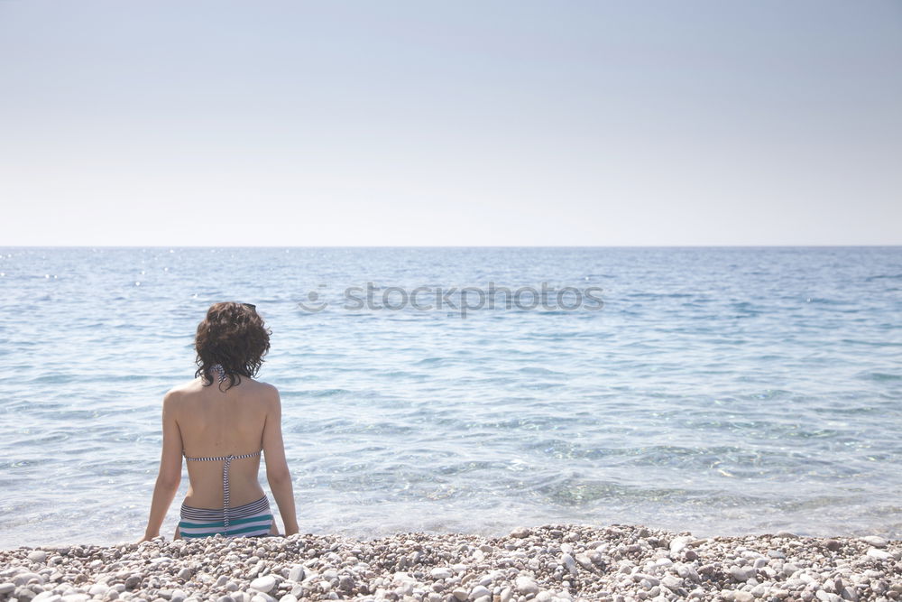 Similar – Image, Stock Photo Woman sitting at edge of rock