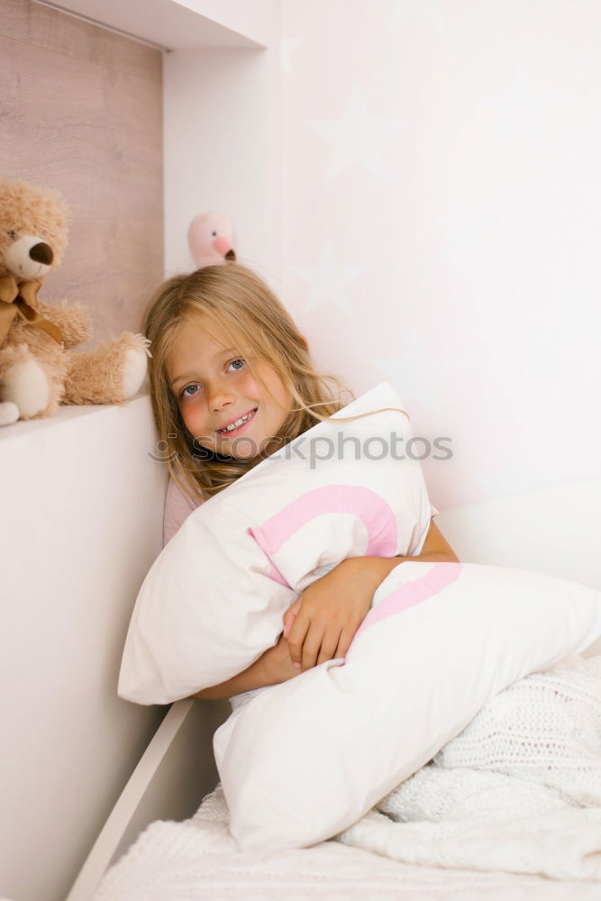 Similar – cute happy child girl relaxing at home on the bed