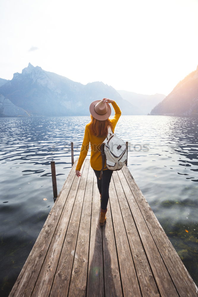 Similar – Image, Stock Photo Woman looking at mountain lake