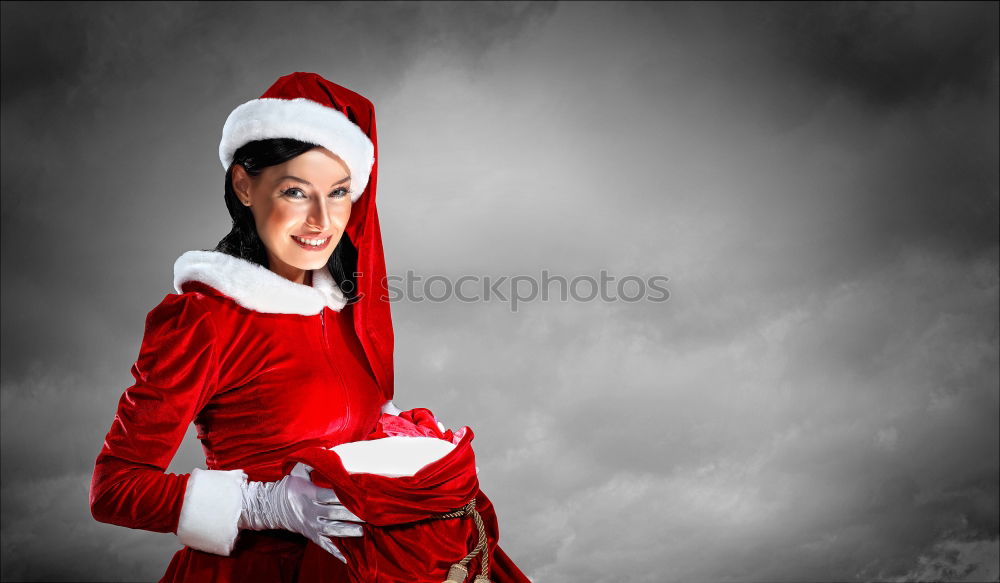 Similar – Portrait of a female shop mannequin with a Christmas Santa hat on her head.