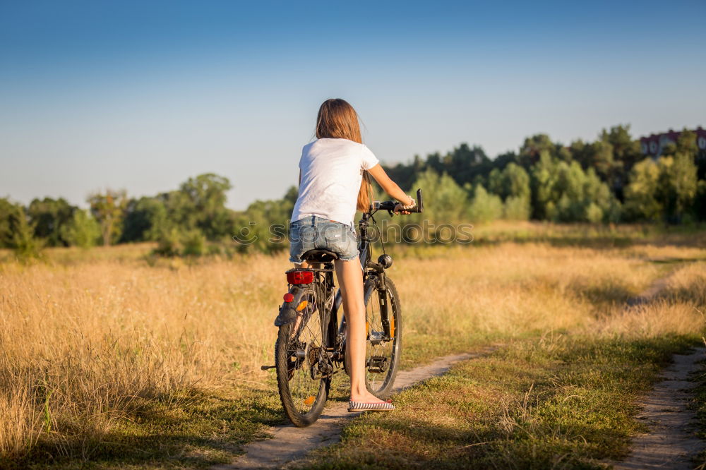 Similar – Image, Stock Photo Who loves his bike, pushes it