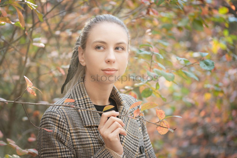 Similar – Beautiful girl in black coat oudoor