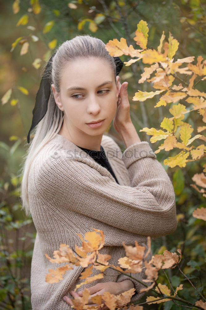 Similar – Portrait of a young blonde woman gesturing