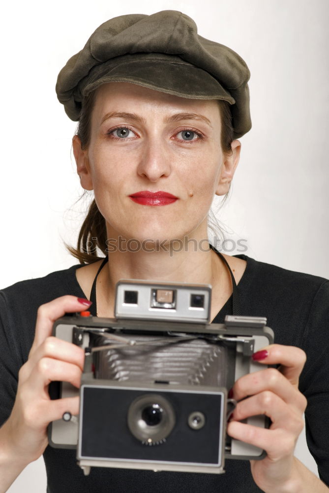 Similar – Image, Stock Photo Young blonde girl using an instant camera