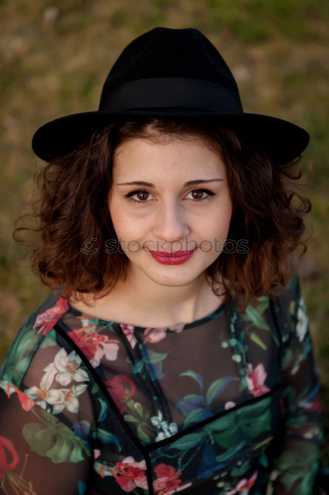 Similar – Young natural woman with freckles and wild curly hair looking at the camera