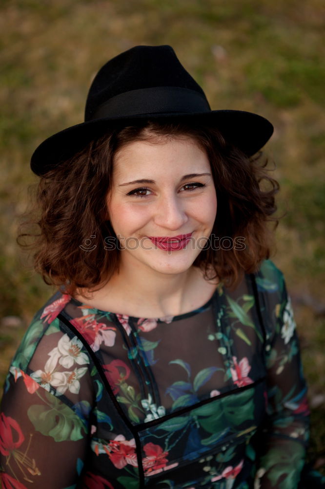 Similar – Young natural woman with freckles and wild curly hair looking at the camera