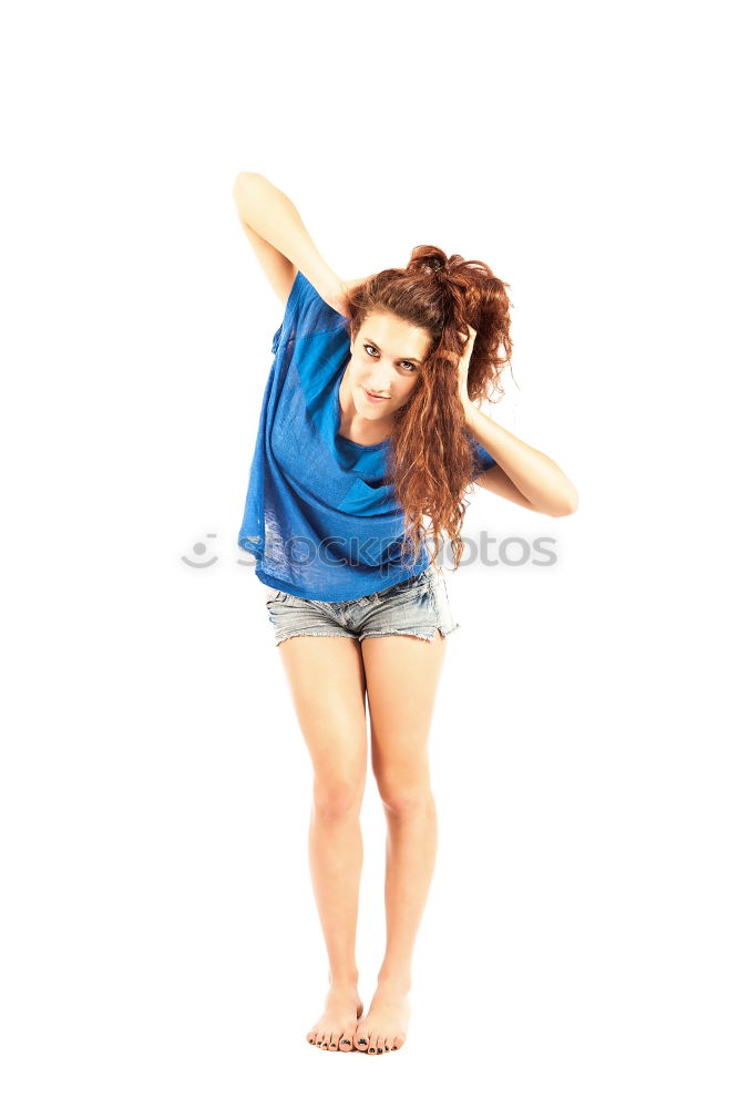 Similar – Image, Stock Photo Young, slim, athletic woman stands barefoot with hotpants in the room and looks at the ceiling with laughter
