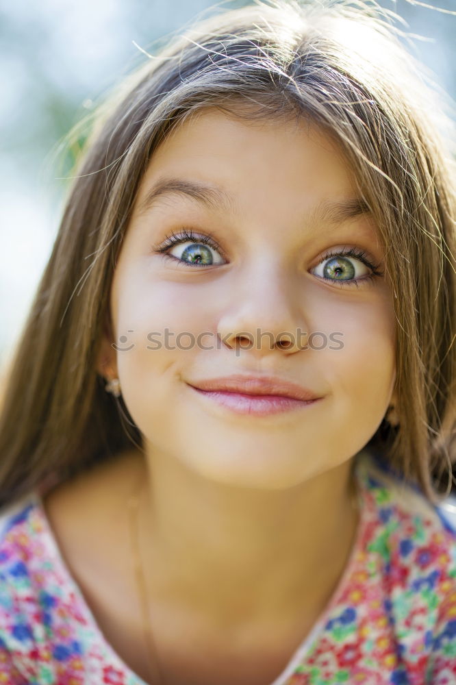 Similar – happy kid girl drinking tea for breakfast.