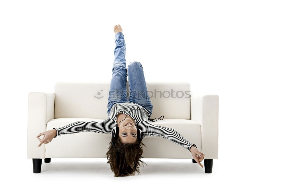 Similar – Image, Stock Photo Feet up. Casual young woman sits barefoot on a comfortable armchair, relaxes, raises her legs. vertical.