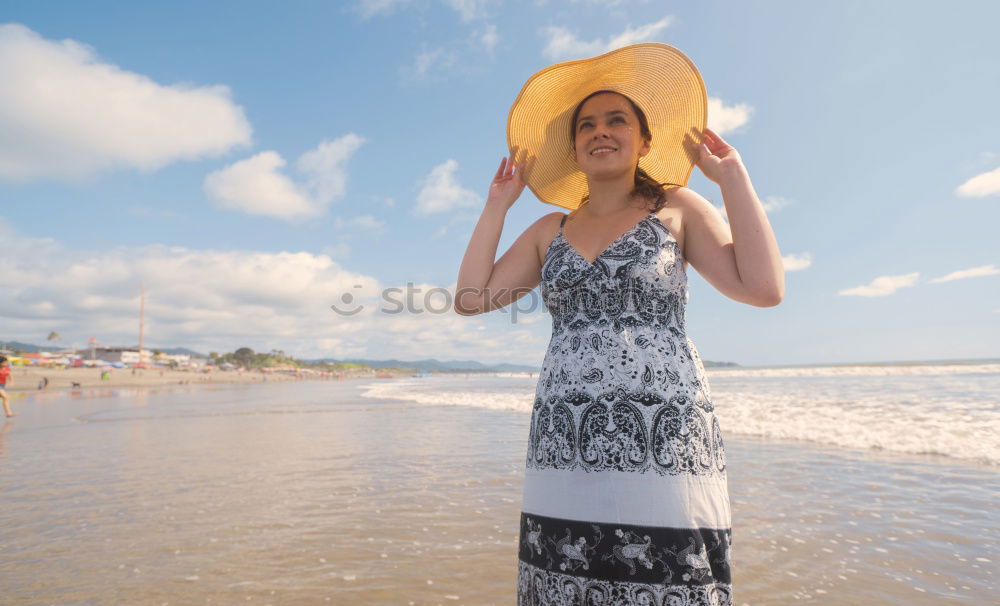 Similar – Image, Stock Photo Elderly woman on the beach wearing a straw hat