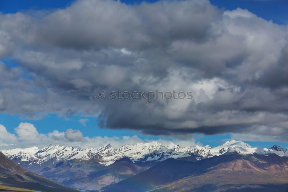 Similar – Image, Stock Photo Clouds and shadows in the Dolomites portrait