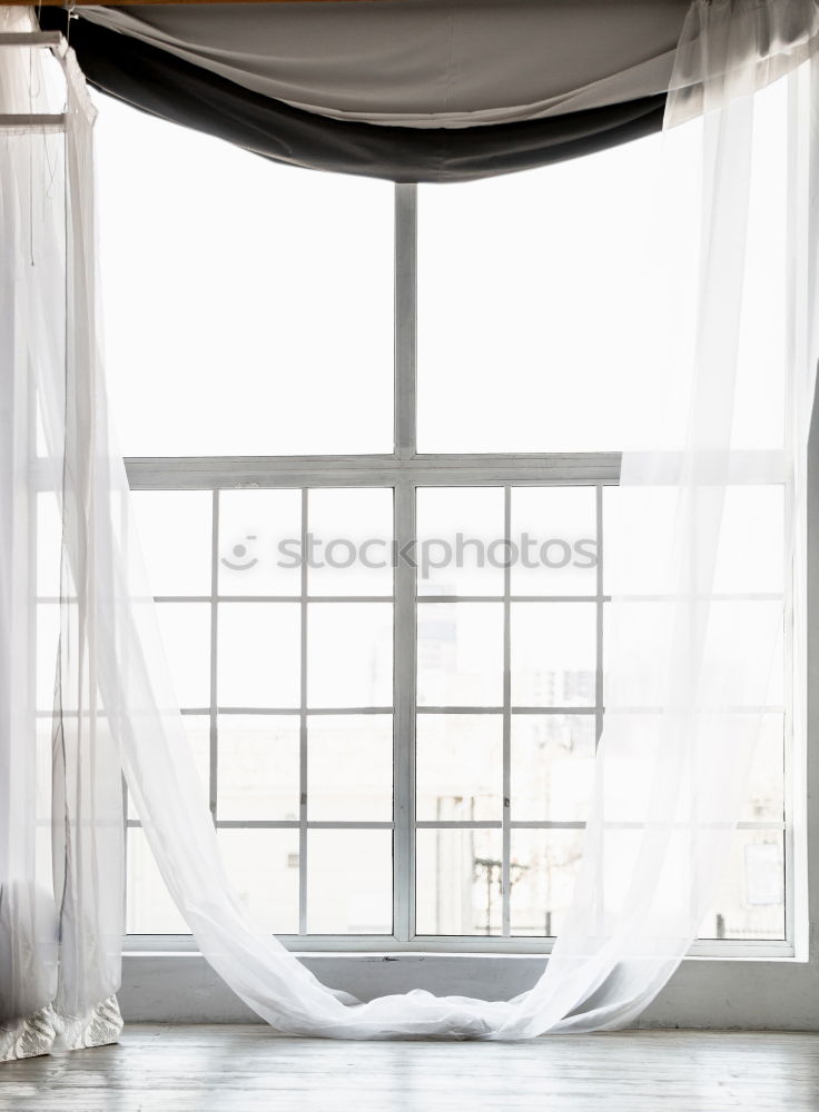 Similar – Opened window with curtains and flowered curtains