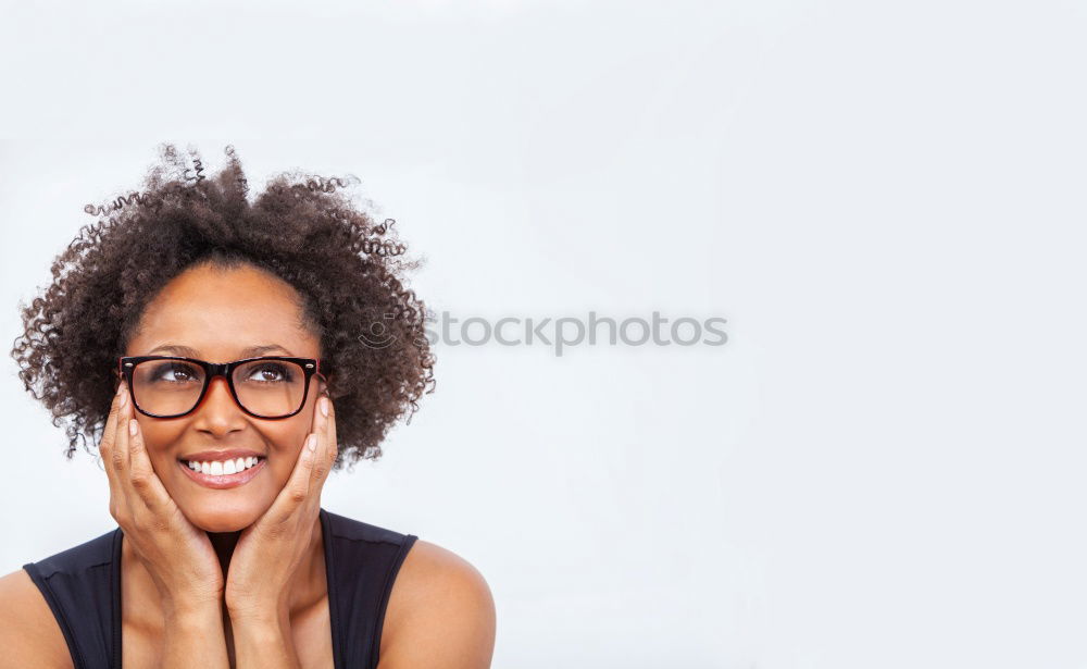 Similar – Beautiful African girl with curly hair on the rooftop