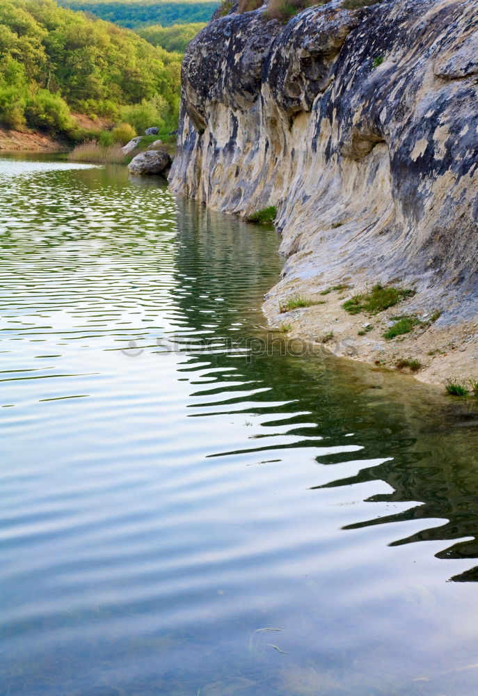 Similar – Lake in sunny mountains