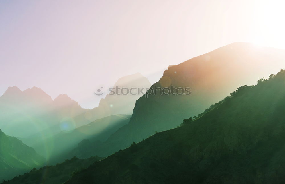 Similar – Sunny evening in mountains. Autumn village on hillsides