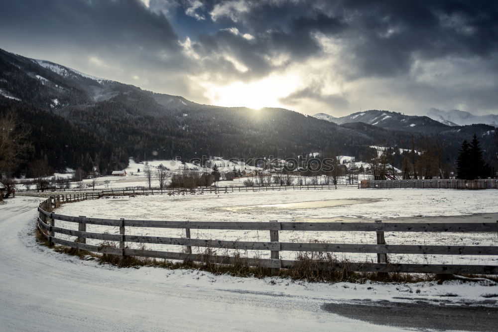 Similar – Landscape of snowy winter road with curves in the mountain