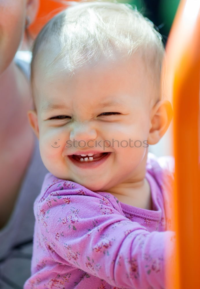 Similar – Young girl playing to driving a toy car