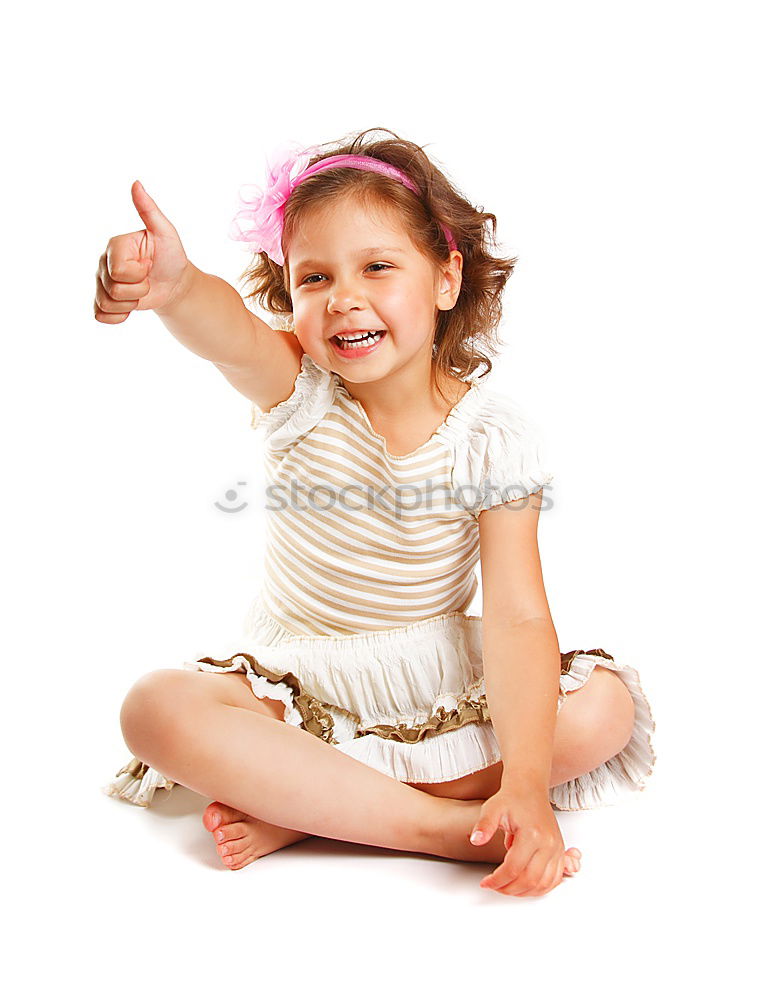 Similar – Little girl enjoying her role of princess. Adorable cute 5-6 years old girl wearing pink princess dress and tiara