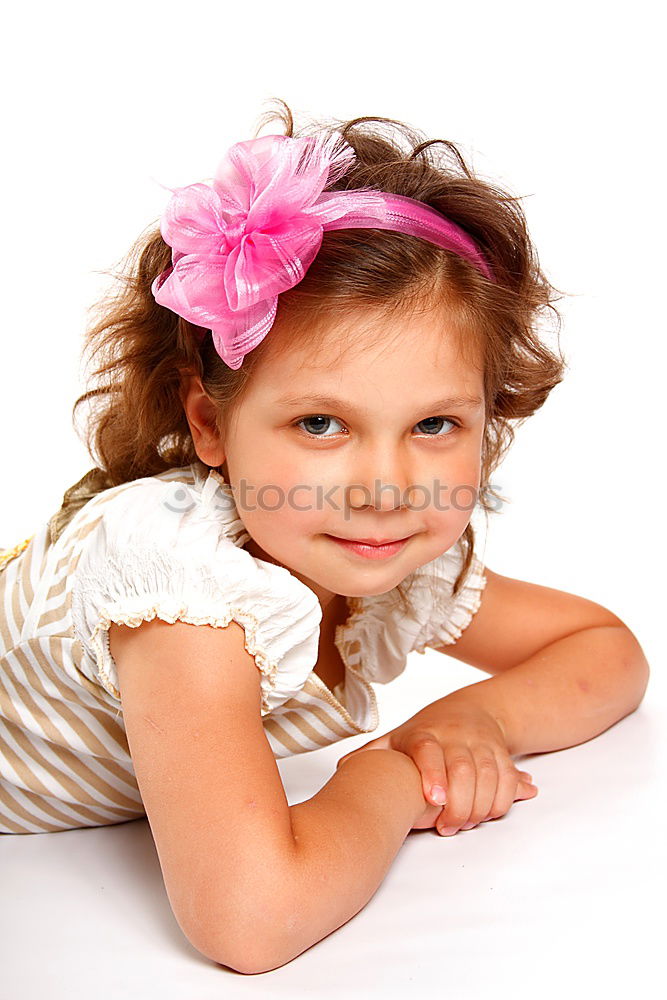 Similar – Little girl enjoying her role of princess. Adorable cute 5-6 years old girl wearing pink princess dress and crown