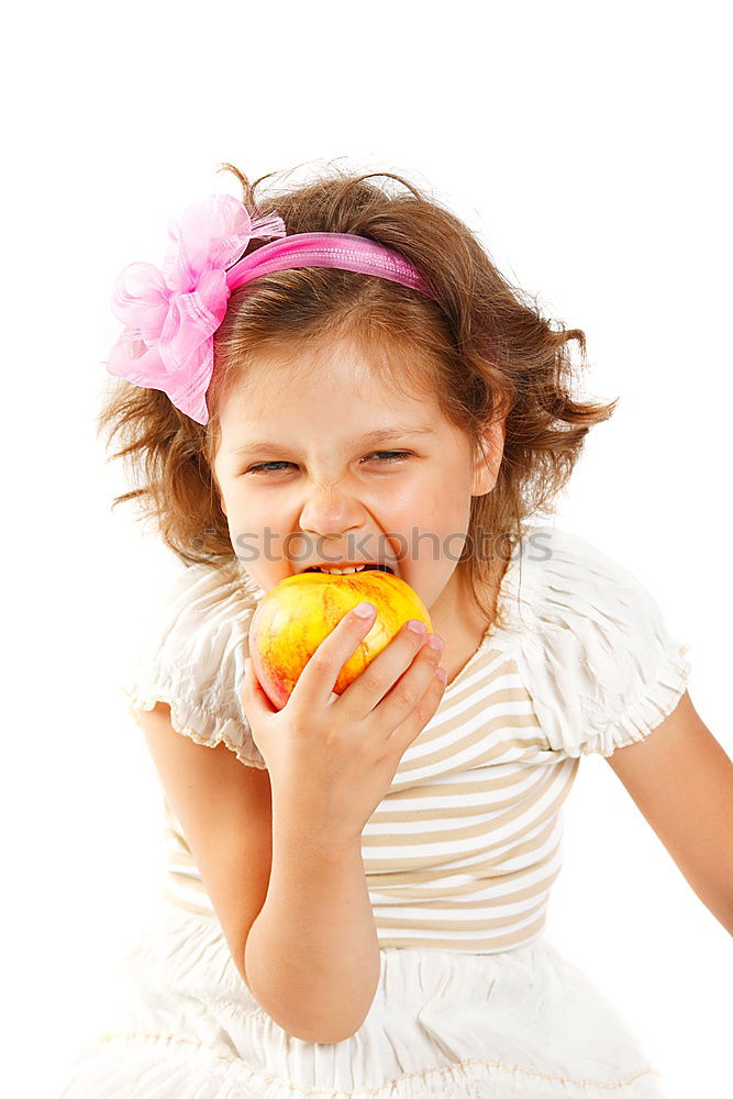 Similar – smiling baby with an orange on blue background