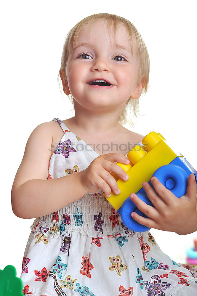 Similar – Young girl playing to driving a toy car