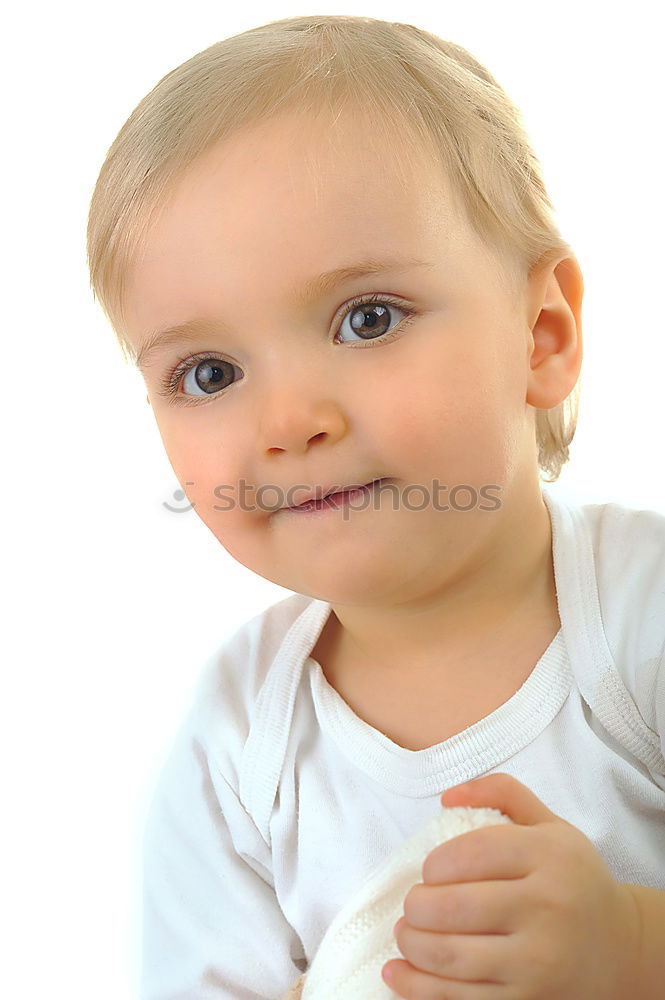 Similar – Image, Stock Photo An unfocused portrait of a blue-eyed baby, hugging its mother, who is holding it in her arms