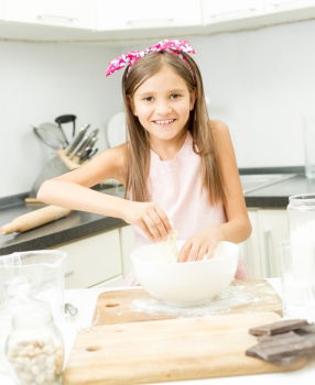 Similar – Image, Stock Photo Portrait of little girl preparing baking cookies.